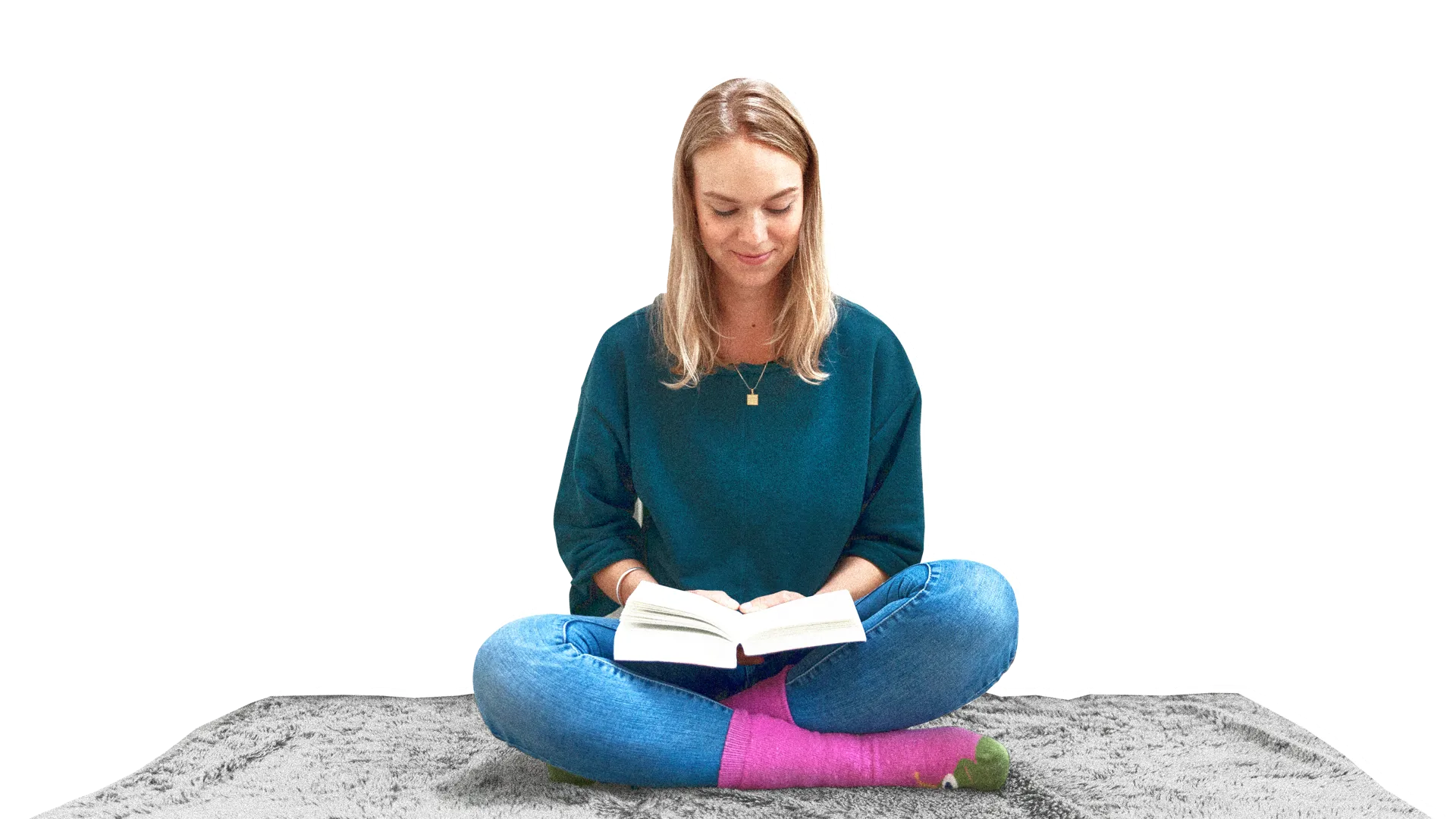 Boek Vrouw leest een boek op een kleed